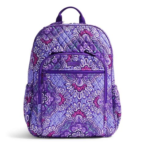 Purple vera bradley backpack - Exterior features a zip pocket at back side seam and a patch pocket compartment with an external zip pocket, a slip pocket and two pen slips inside it. D-ring at strap top for keys. Zip closures. Dimensions: 9.25" w x 19.25" h x 3.0" d with 37.5" adjustable strap. Item: ReActive Sling Backpack. SKU# 26679Q34.